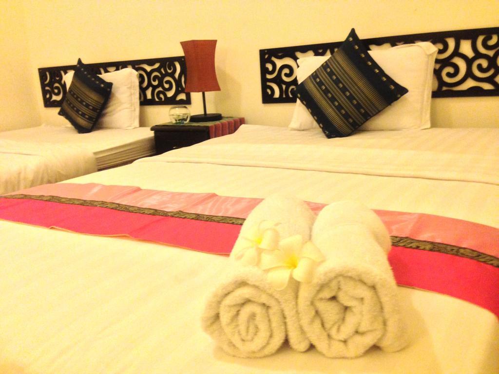 New Season Riverside Hotel Phnom Penh Quarto foto