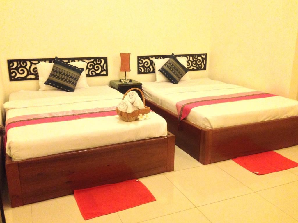 New Season Riverside Hotel Phnom Penh Quarto foto
